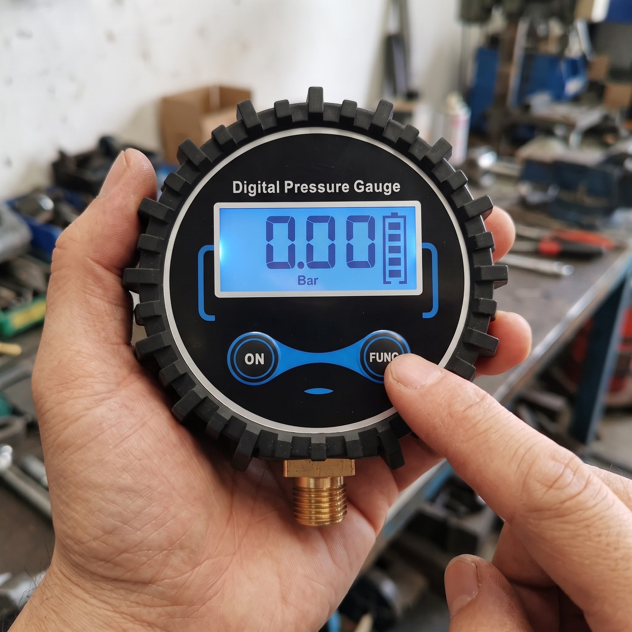 Close detail of Roadwell gauge display, buttons and brass fitting
